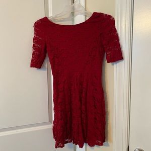 Red floral dress. Quarter length sleeves. Like new